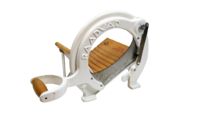 Raadvad brødskærer i hvid. Excellent condition.