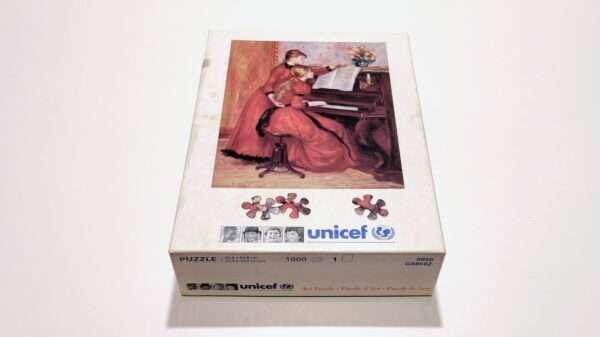 Unicef puslespil 1000 brikker. 8850. I særdeles flot stand. Pierre Auguste Renoir – The piano Lesson.