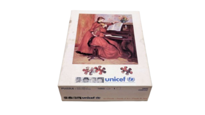 Unicef puslespil 1000 brikker. 8850. I særdeles flot stand. Pierre Auguste Renoir - The piano Lesson.