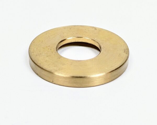 Mellemstykke messing. Ø24. 3 mm høj. M10,5 centerhul. Special del.