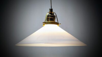 Holmegaard antik skomager pendel. Ø27,5 , 9 cmH. Messing m.m. 1930.