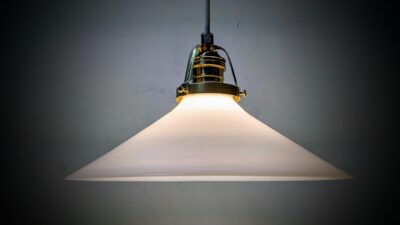 Holmegaard antik skomager pendel. Ø26 , 9 cmH. Messing m.m. 1930.