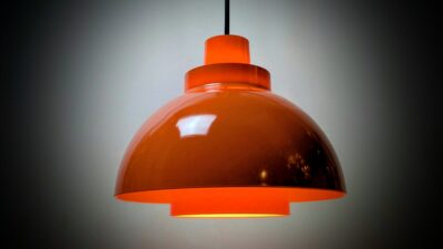 K.Kewo design. Produceret af Nordisk Solar. Model Minisol i Orange. Made in Denmark. 1970. Nyt el. Ø23